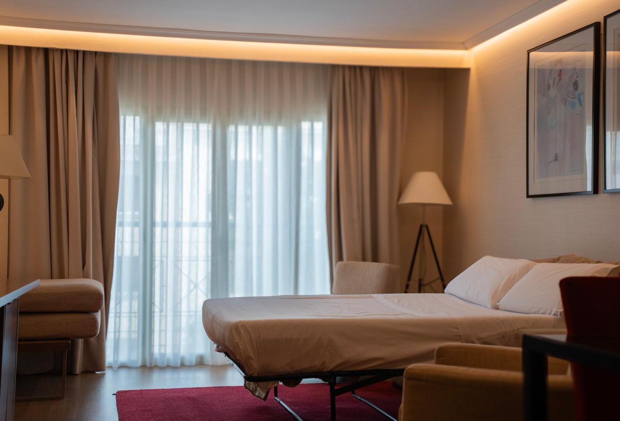 Aparto-Hotel Rosales Madrid Bagian luar foto